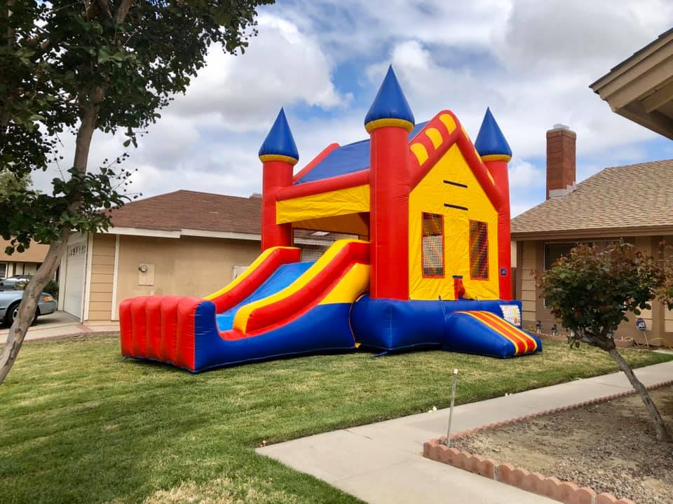 Large bounce house combo slide