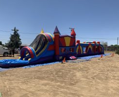 Obstacle Course plus dual lane bounce house combo slide